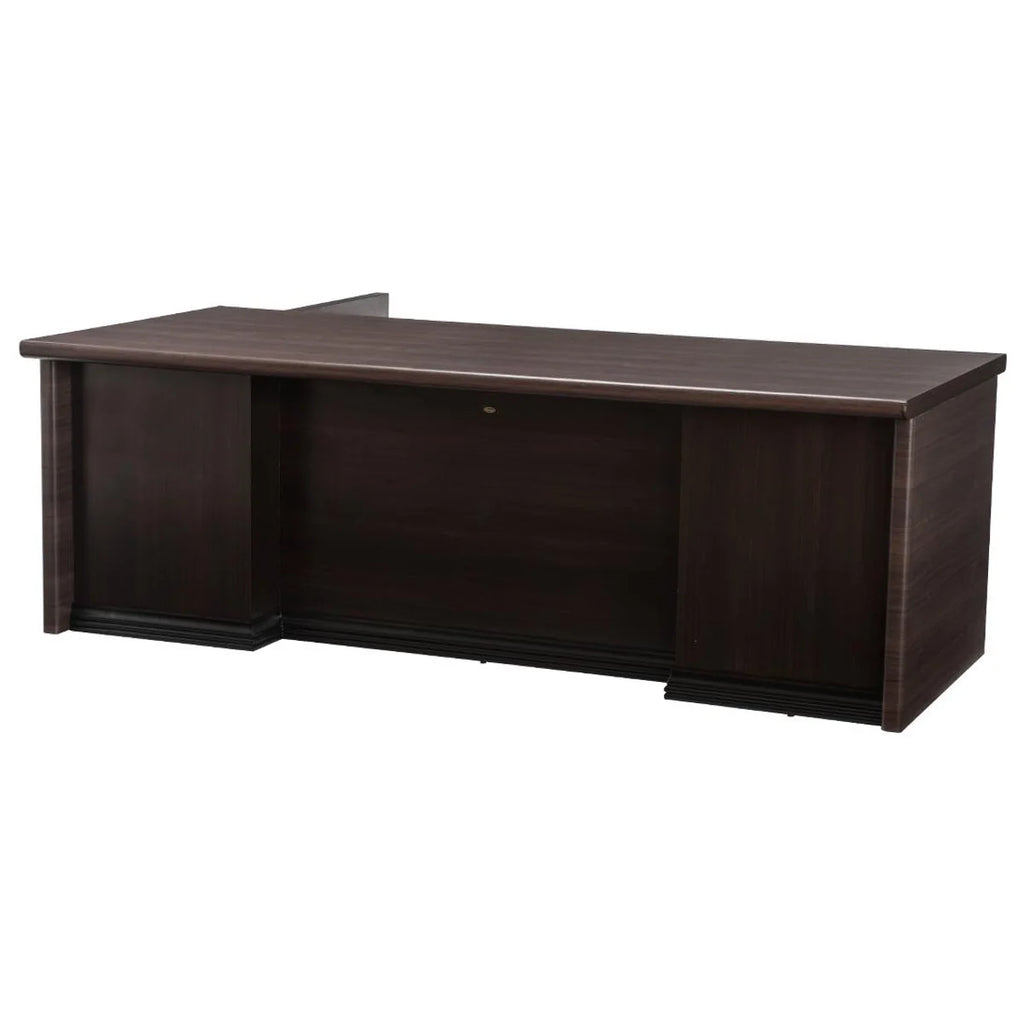 https://www.lakdi.com/products/director-l-shape-table-made-in-pre-laminated-particle-board-matte-finish-and-brown-smoke-oak-color